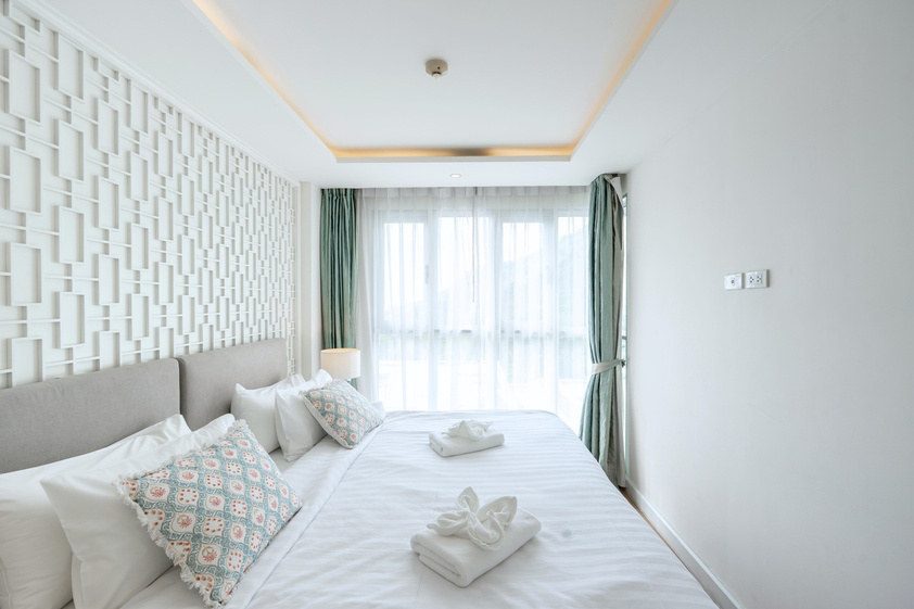 King size bedroom in a SEAVALE fully furnished unit